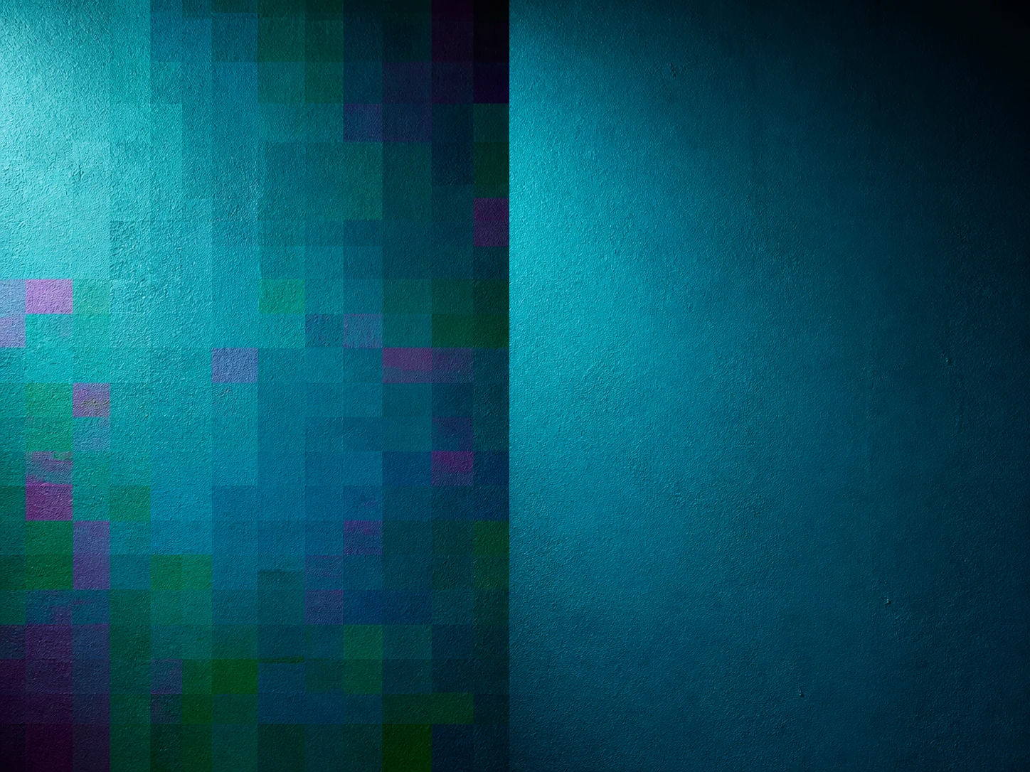 A repeatedly resaved JPEG with square blocks along a flat wall